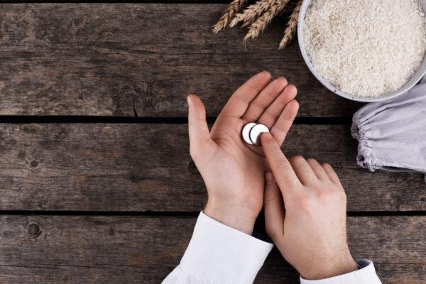 Hands counting coins, representing Nadhr in Islam. Donation support by ETH.