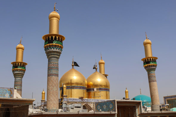 Golden domes and minarets of the Shrine of Kazimayn, a monument to Imam Musa al-Kazim's resilience. Offering anonymous charity via USDT.